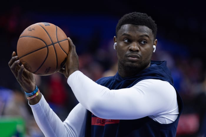 Zion Williamson holds the ball